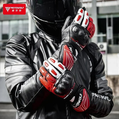 Motorcyclist in black helmet and jacket wearing red and black protective motorcycle gloves