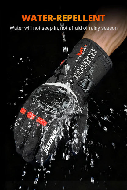 Water-repellent motorcycle glove deflecting water, black with red accents, for cold weather riding